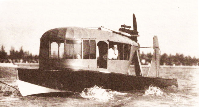 a black and white photo of an old airboat 2