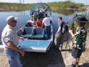Guests boarding a guided airboat for Everglades airboat tours, preparing for a private ride through the wetlands with Captain Randy in South Florida.